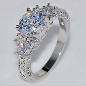 NWT Elegant Silver Diamond Ring with Blue Center Stone and Pavé Diamonds